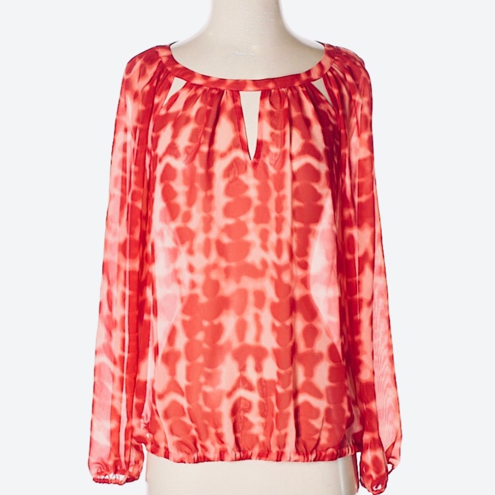 Jennifer Lopez Red sheer blouse